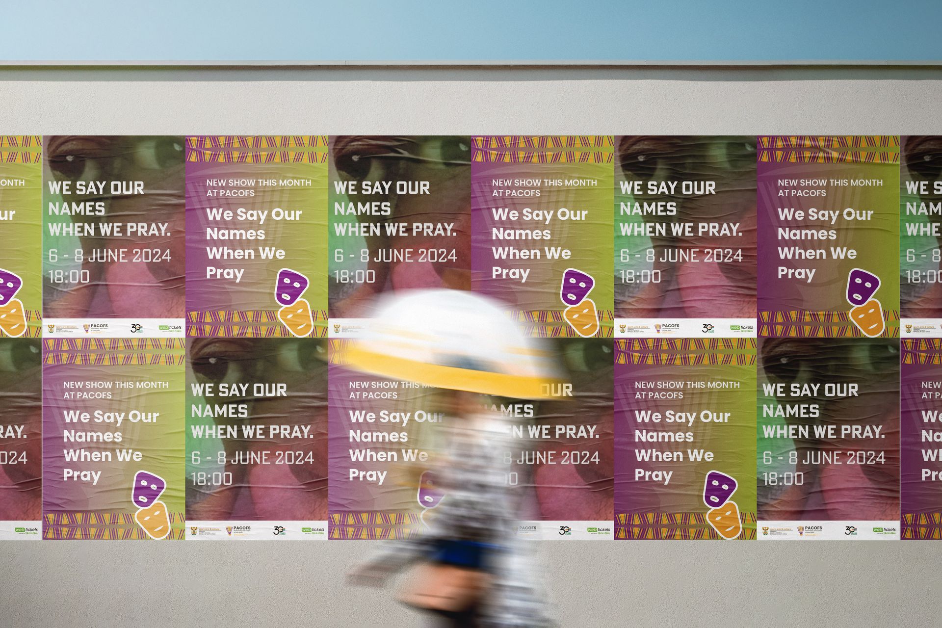 PACOFS brand refresh — street poster campaign mockup showing multiple posters glued to a wall