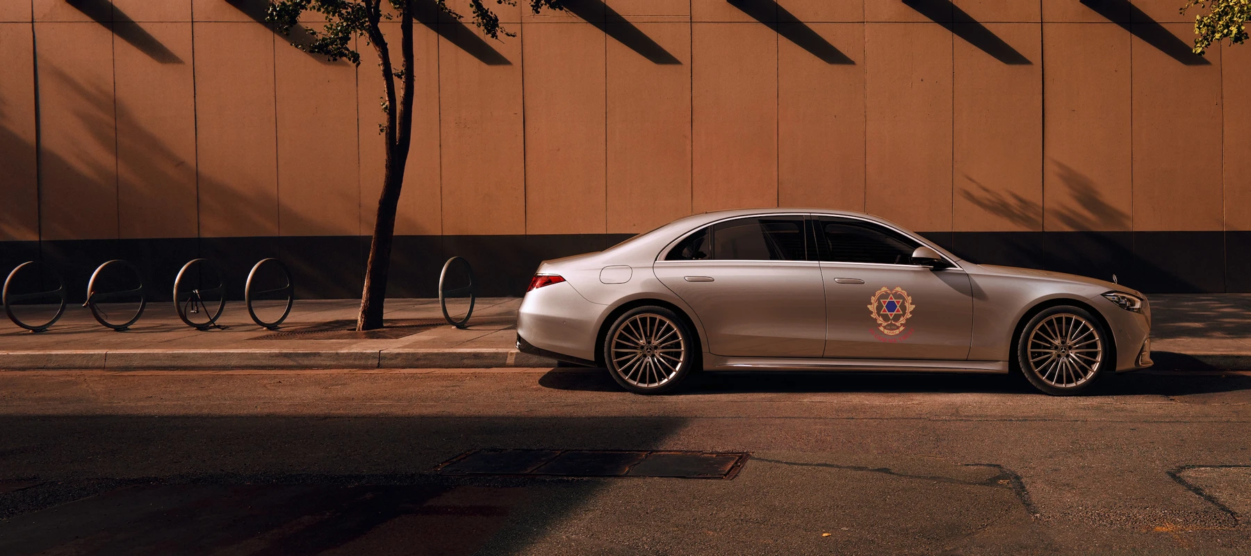 Mercedes-Benz S-Class · crest mockup showing the IPHC crest on the vehicle door